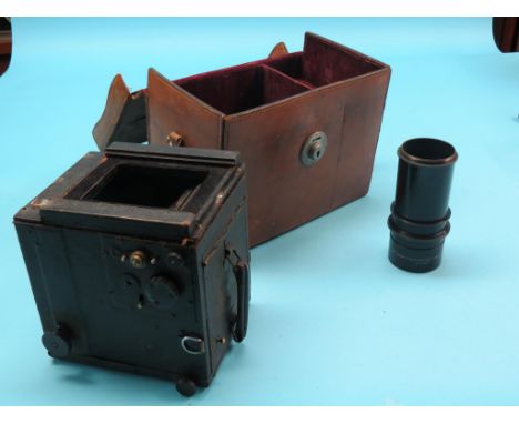 An early Adams & Co.  vintage plate camera, lens inscribed Taylor-Hobson Anastigmat 6in. F/3.9, complete with Ross Telecentri