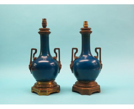 A pair of 19th century Chinese ormolu-mounted vases, enamel on copper in blue monochrome, globe-and-shaft form with twin ormo