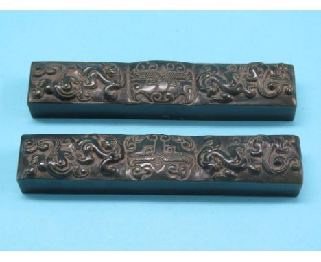 A pair of Chinese green jade-type carvings, elaborate dragon and lion-mask designs, 6in.