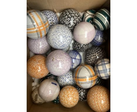 A large quantity of 19th and early 20th century carpet balls, in various patterns and colours, including Victorian ceramic bl
