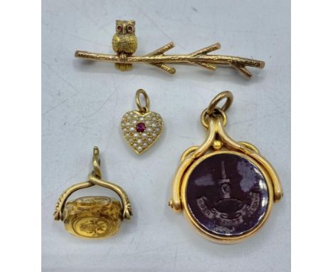 A 15ct gold Bloodstone and Carnelian swivel intaglio watch fob together with an unmarked intaglio quartz set example a 9ct go