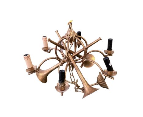 A gilt coloured modern 6 branch chandelier, modelled with two crossed hunting horns, 37cm High 