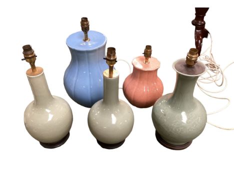 Five ceramic table lamps to include a pair of Celadon style bulbous table lamps and a similar celadon style table lamp, an or