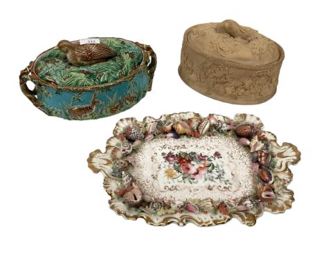 A Majolica style game dish in the Minton/George Jones style, kite mark to base with one other ceramic pie dish and a floral d