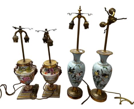Two pairs of good lamps,  late C19th and early C20th, one  pair milk glass with overlaid flora and fauna, 58cm H; and a pair 