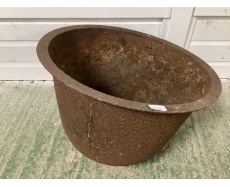A weathered/rusty round based planter, 52cm diameter 