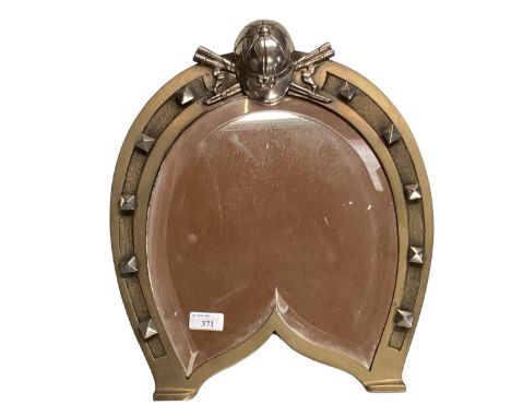 Bronze and unmarked white metal mirror in the form of a horse shoe topped by jockey hat with bevelled plate 36cmW x 45cmH 