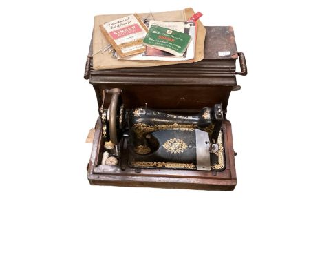 A vintage Singer sewing machine, and two brass letter door boxes 