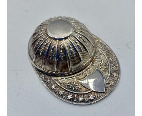 A sterling silver caddy spoon modelled as a Jockeys cap. In fitted case by Francis Howard Sheffield 1971. 