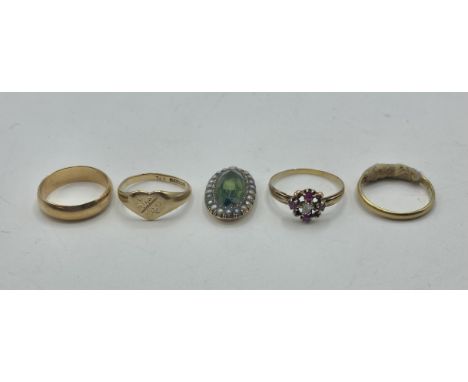 A collection of gold and unmarked yellow metal items to include an unmarked ruby and diamond set ring a 9ct gold heart ring, 