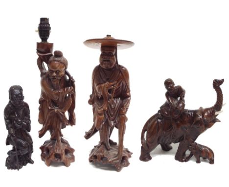 Two carved Chinese root wood carved figural lamp bases, 14" and 15" high respectively; together with a carved Chinese figure 