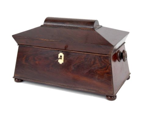 19th century rosewood sarcophagus tea caddy, the hinged cover enclosing fitted interior of two dome top chests and central gl