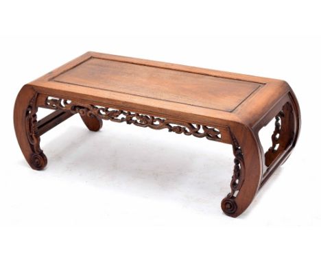 Chinese hardwood opium table, with open bowed ends and foliate pierced carved frieze, 38" wide x 17" deep x 13.75" high-** Pr