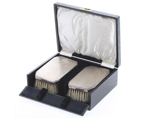 Art Deco cased pair of silver engine turned brushes, maker John Rose, Birmingham 1936, monogrammed EW, each brush 4.5" x 2.25