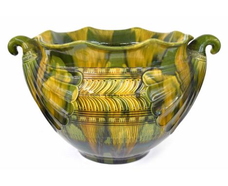 Large Ault Pottery jardiniere designed by Christopher Dresser, in the Egyptian style with scroll handles, mottled majolica gl