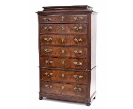 19th century walnut and crossbanded tallboy, the moulded caddy top over seven long graduated drawers, raised on a short plint