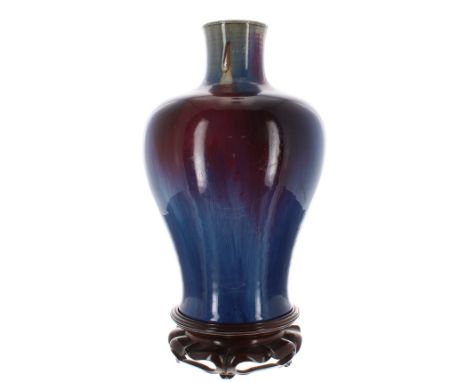 Chinese Sang-De-Boeuf porcelain glazed baluster vase, with high-fired glaze, the vase 13" high, with a hardwood stand- ** Pro