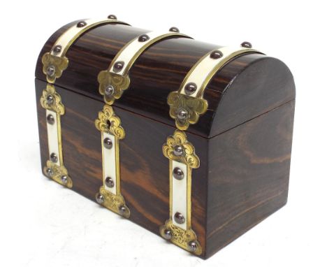 Victorian coromandel dome top tea caddy, with brass and ivory strap work decoration, the hinged cover enclosing an interior o