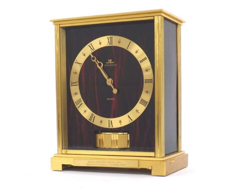 Good Jaeger LeCoultre 'Embassy Red' model Atmos clock, the 5" gilt brass chapter ring with faux red and black marble dial pla