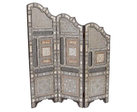 Early 20th century decorative hardwood three-fold screen, profusely inlaid with geometric mother of pearl, ebony and sandalwo