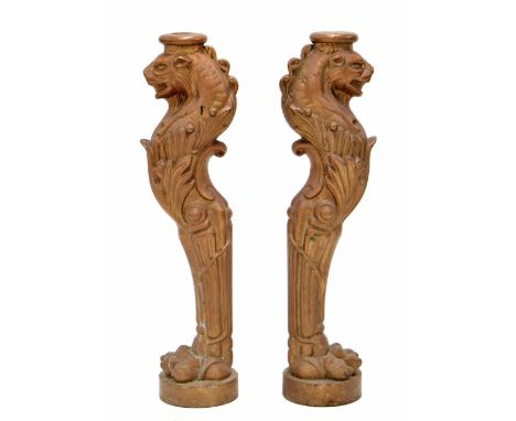 Decorative pair of heavy painted cast metal structural supports/ console legs, modelled as lions heads over a single leg and 