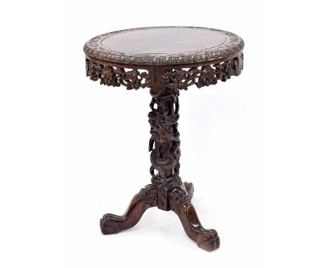 Chinese hardwood circular occasional table, the top carved with a continuous band of fruiting foliage over a pierced foliate 