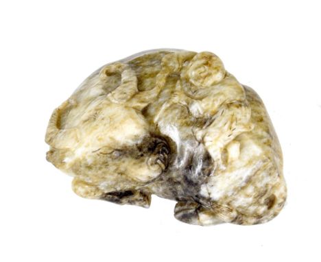 Chinese carved jade of recumbent oxen with a figure on its back, 3" long
