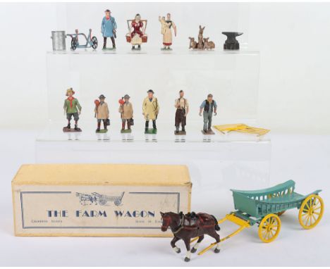 Britains Village Idiot and other Farm figures, with green smock and yellow hat (condition good) two carters with whips, man w