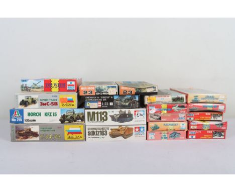 Collection of boxed 1:35 and 1:72 Military Vehicle plastic kits, 1:35 scale Tamiya M 1133 U.S Armoured personnel carrier, Stu