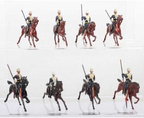 Britains set 81, 17th Lancers Ulundi service dress with 'rocking' horse Trumpeter, three 'pony' horse Troopers, three trottin