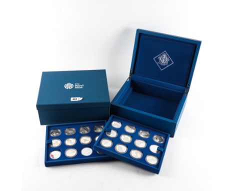 A ROYAL MINT QUEEN'S DIAMOND JUBILEE SILVER PROOF CROWN COLLECTIONComprising; twenty-four silver proof crown sized commemorat