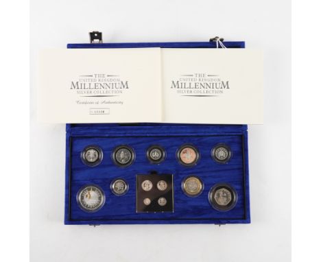 A ROYAL MINT UNITED KINGDOM MILLENNIUM SILVER COIN COLLECTIONComprising; thirteen proof coins from five pounds to one penny a
