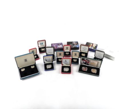A GROUP OF ROYAL MINT SILVER PROOF COINAGE (18)Comprising; eight crowns, three two pound coins, six one pound coins and one f