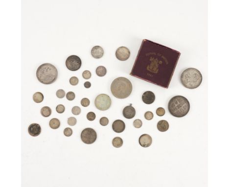A GROUP OF HANOVERIAN, VICTORIAN AND LATER MOSTLY SILVER COINSTo include George II, George III, including crowns, 1818 and 18