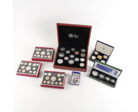 A GROUP OF MOSTLY ROYAL MINT COINS AND ALSO A MEDALLIONComprising; a 2018 premium proof coin set of fourteen coins, three yea