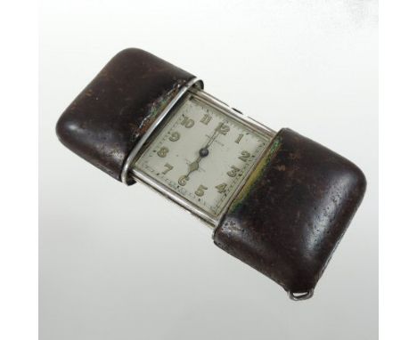 An early 20th century Movado silver purse watch, the square dial showing Arabic numerals, 7cm