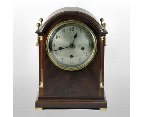 A 19th century mahogany cased bracket clock, the silvered dial showing Arabic hours, signed Cowell and Hubbard, Cleveland, ha