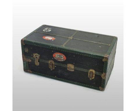An early 20th century metal bound travelling trunk, the interior fitted with a wardrobe, by Schemen, 102cm