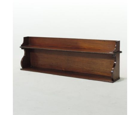 An early Victorian mahogany hanging shelf, with beaded decoration, 115cm