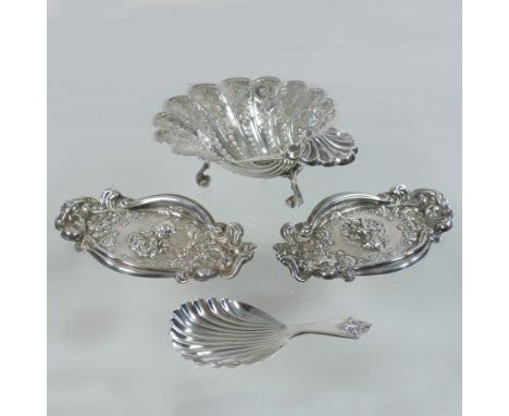 A modern silver shell shaped bon-bon dish, raised on three scrolled feet, Birmingham 1971, 13cm, together with a silver caddy