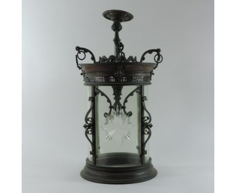 A 19th century brass and glass lantern, of circular shape, 60cm high