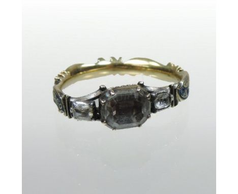 A Georgian gold and enamel three stone mourning ring, inscribed Ann Griffin O.B. 15 Sep.1752 AET 60