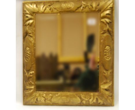 20th century gilt cushion framed mirror, 47cm high and 40cm wide.