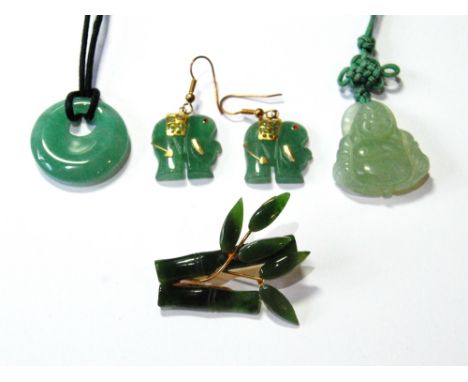 Pair of jade earrings, two pendants and a brooch.