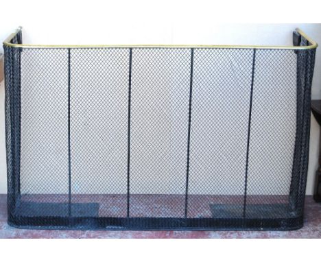 Victorian brass and wire fireguard, 81cm high and 128cm wide.