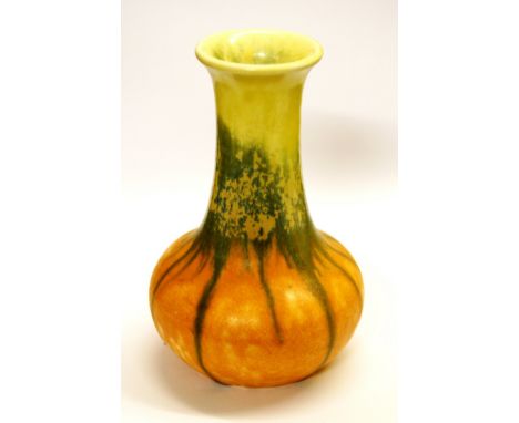 Ruskin pottery vase of organic form with trailed yellow, green and orange glaze, signed W. Howson Taylor, 19cm high. Conditio