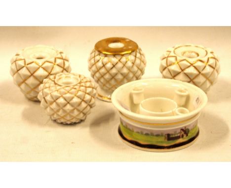 Four gilt porcelain inkwells and a circular inkwell.   (5)