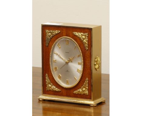 Late 20th century 'Swiza' gilt metal and walnut mantel clock, 7 jewel movement, oval shaped dial, H16cm   Condition Report   