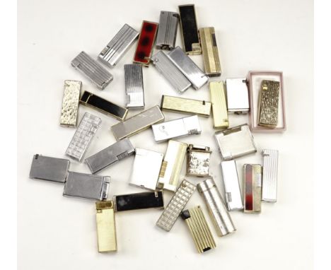 A quantity of vintage gas roller cigarette lighters, including Flick, Ronson etc