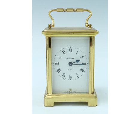 A late 20th Century brass carriage clock, keyless wind and set, movement marked 'Douvrdrey and Bloquel, France' white dial wi